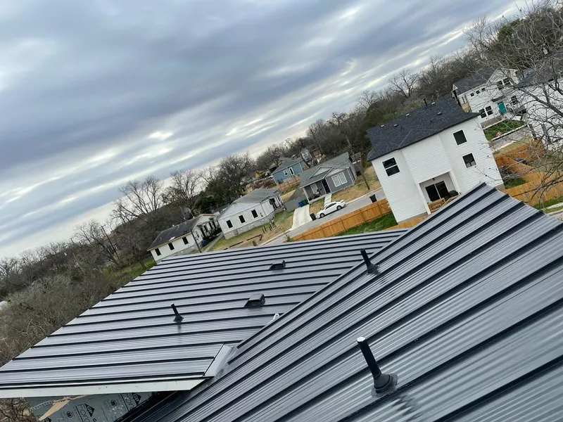 Standing seam metal roof panels with vents for Skylight Repair in Cedar City